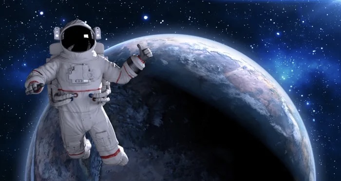 Astronaut against the backdrop of planet earth