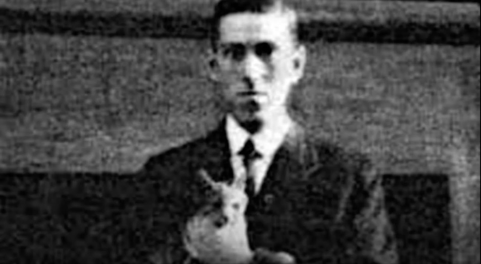 A man holds a cat in his hands