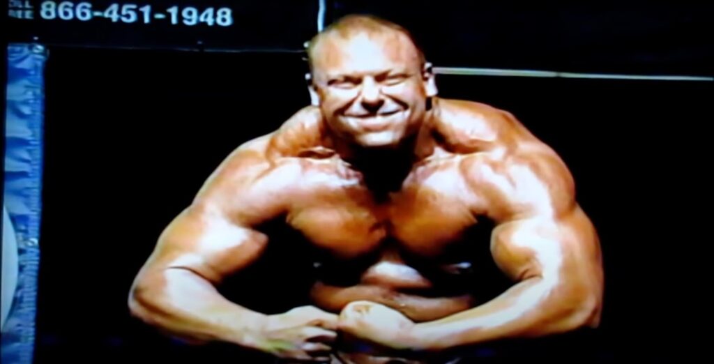 Andrew Collura poses on stage