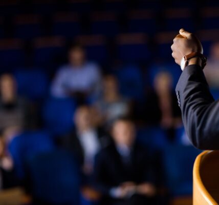 Close up of man giving a speech